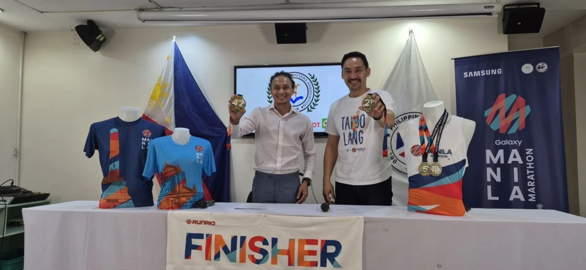 Manila Marathon race organizer Rio Dela Cruz, left, and Run Rio Inc. managing director Andrew Neri.