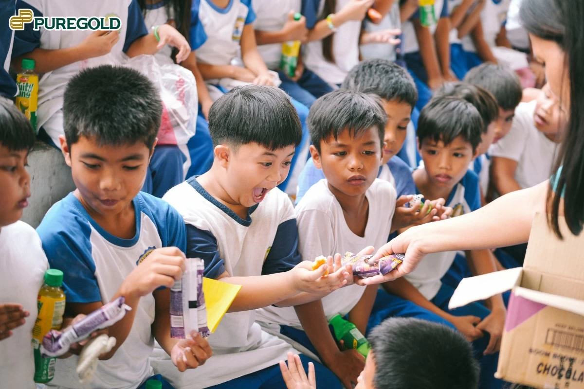 Joy was evident on the faces of the Talim Island students as they received aid from Puregold.