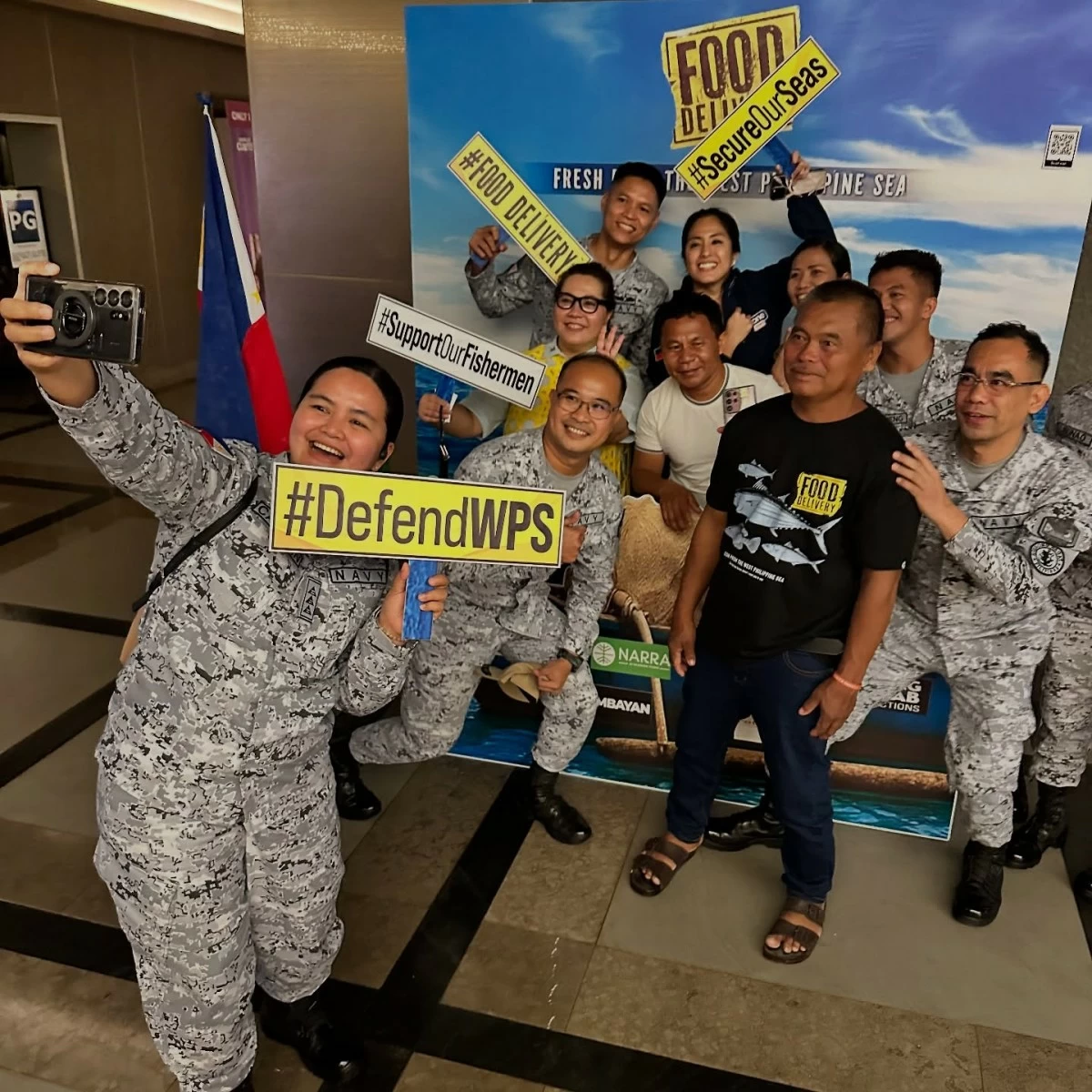 TRUE HEROES Baby Ruth Villarama (far left, second row) and the defenders of the West Philippine Sea