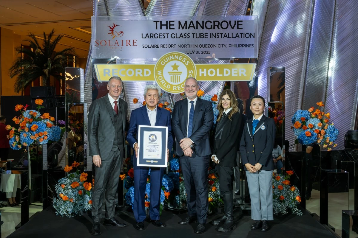 HISTORIC RECORD (From left) Bloomberry Resorts Corp.’s president and COO Gregory Hawkins, vice chairman of Construction and Regulatory Affairs Donato Almeda with Solaire Resort North COO Damian Quayle, Habitus Design Group founder Samantha Drummond, and the official Guinness World Record adjudicator Emi Saito