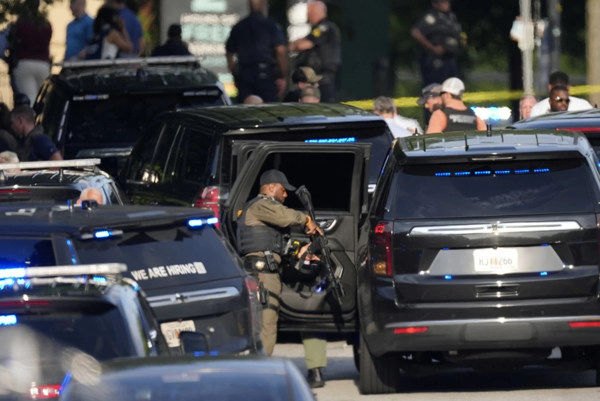 AN armed police officer prepares near the scene of the shooting at the Emory University in Atlanta on Friday, Aug. 8, 2025. (AP)