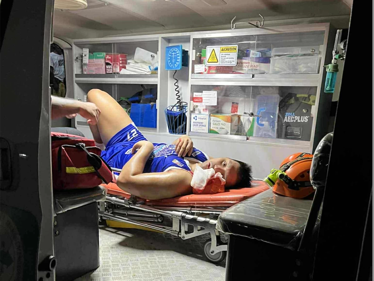 Jonas Tibayan n the ambulance that brought him to the hospital.