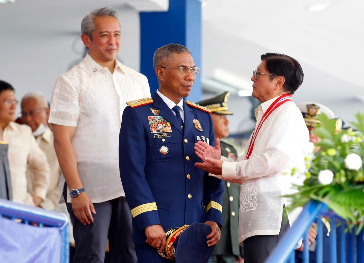 President Ferdinand R. Marcos talks to PNP chief Gen. Nicolas Torre and DILG Secretary Jonvic Remulla during the celebration of the 124th Police Service Anniversary at the PNP Transformation Oval in Camp Crame, Quezon City, August 22, 2025. (Mark Balmores)