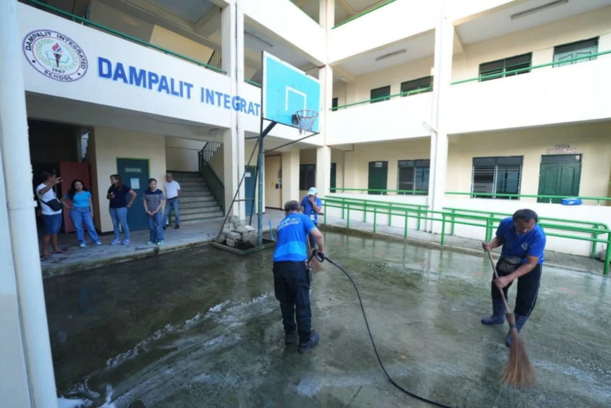 Personnel conducted cleanup drives and sanitation operations in Dampalit Integrated School  (Photo from Malabon City PIO)