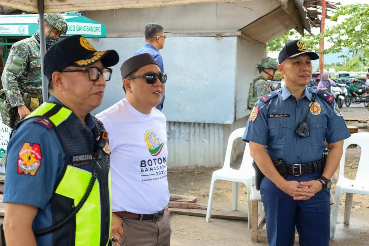 DE Guzman (right). (FB)