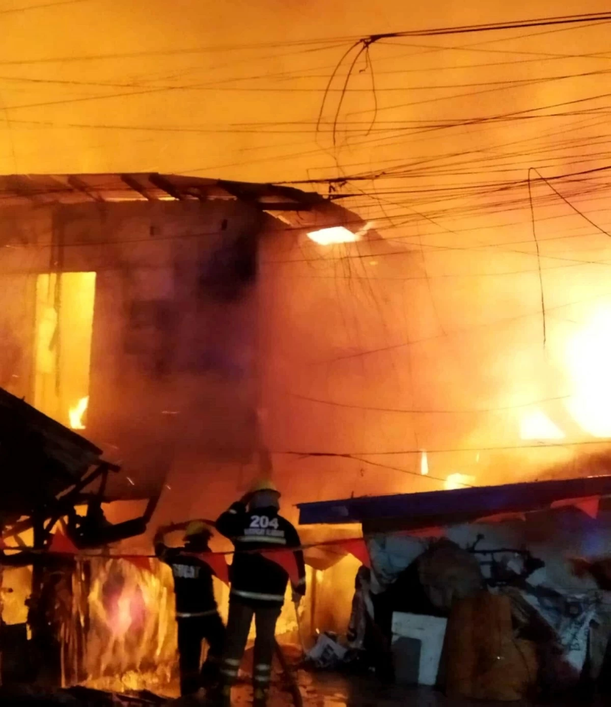 The fire in Barangay Buli, Muntinlupa on Aug. 16 (Photo from Bagong Alabang 204 Fire & Rescue Team on Facebook) 
