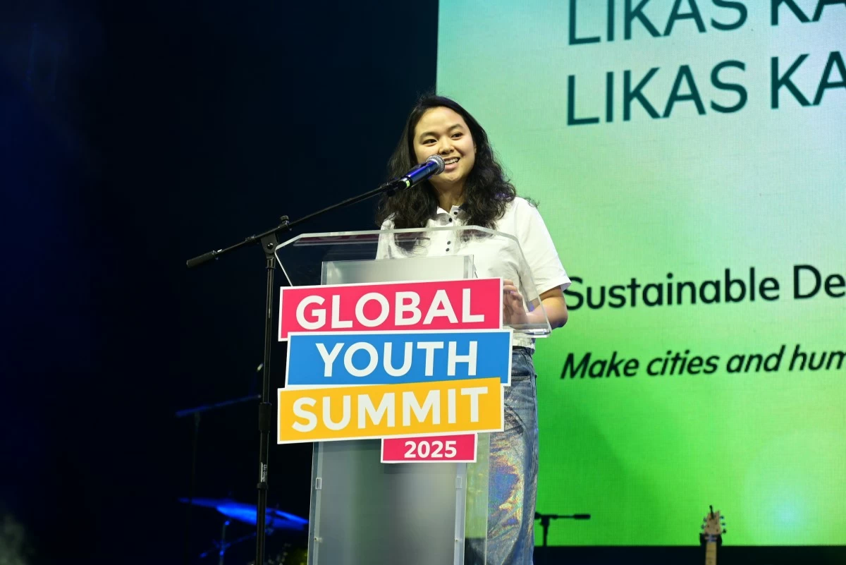 Jessica Sy, SM Sustainability champion, addresses youth leaders at GYS 2025, inspiring action toward sustainable community initiatives.