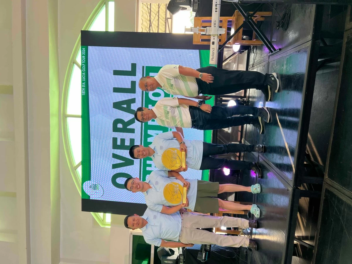 Ralph Chong and Aldric Yao, center, hoist their title in last year's Luzon leg.
