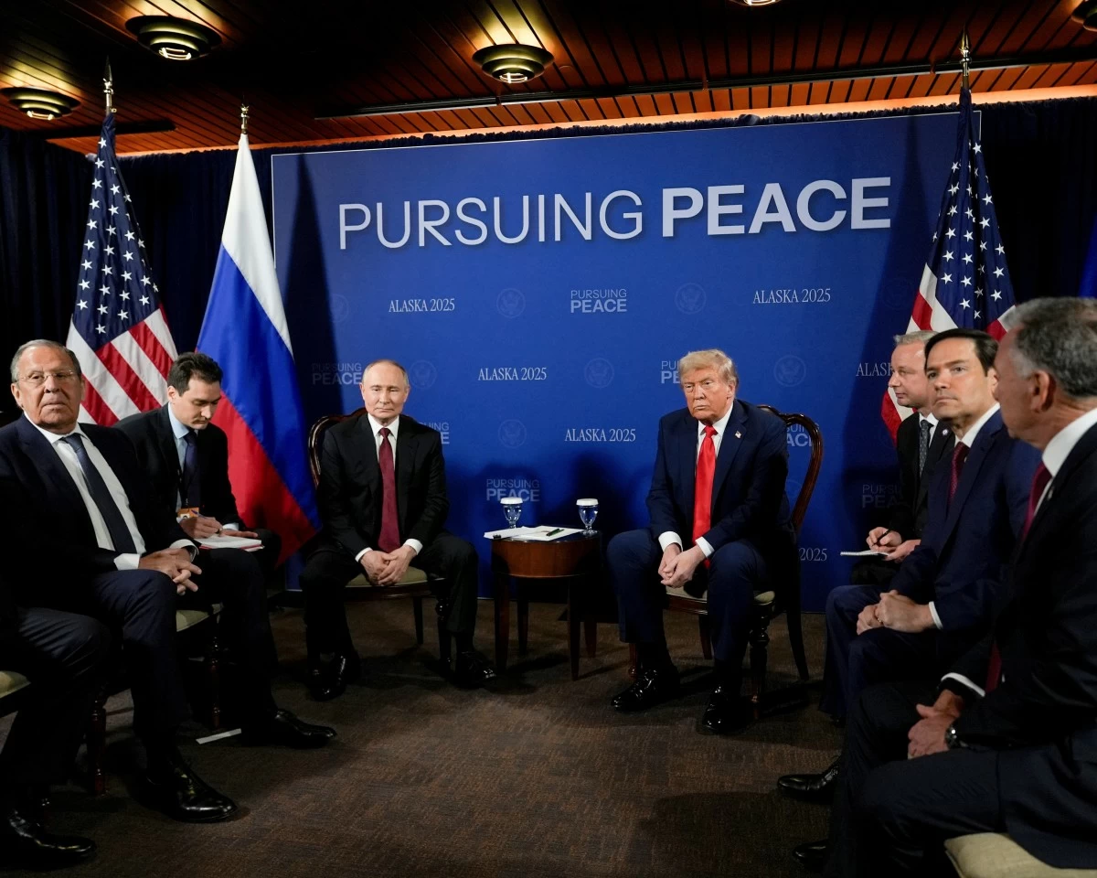President Donald Trump meets with Russia's President Vladimir Putin Friday, Aug. 15, 2025, at Joint Base Elmendorf-Richardson, Alaska. At left is Russia's Foreign Minister Sergey Lavrov and second from right is Secretary of State Marco Rubio. (AP Photo/Julia Demaree Nikhinson)