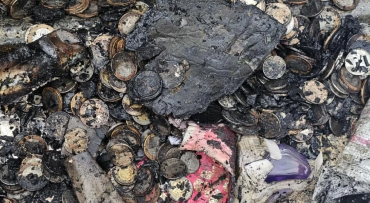 Recovered money from the fire in Barangay Buli in Muntinlupa on Aug. 16 (Photo from BFP Muntinlupa's Facebook page) 