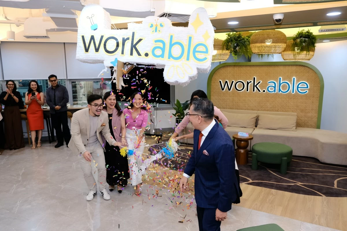 A ceremonial piñata pull marked the official launch of work.able RSC 3 & 4. In the photo are Elton John Peralta, head of work.able; MA Buenaventura, leasing associate director; Jennylyn Llait, special projects senior manager; Stephanie Lopez, special projects manager; and Jericho P. Go, president and CEO of RL Commercial REIT, Inc.