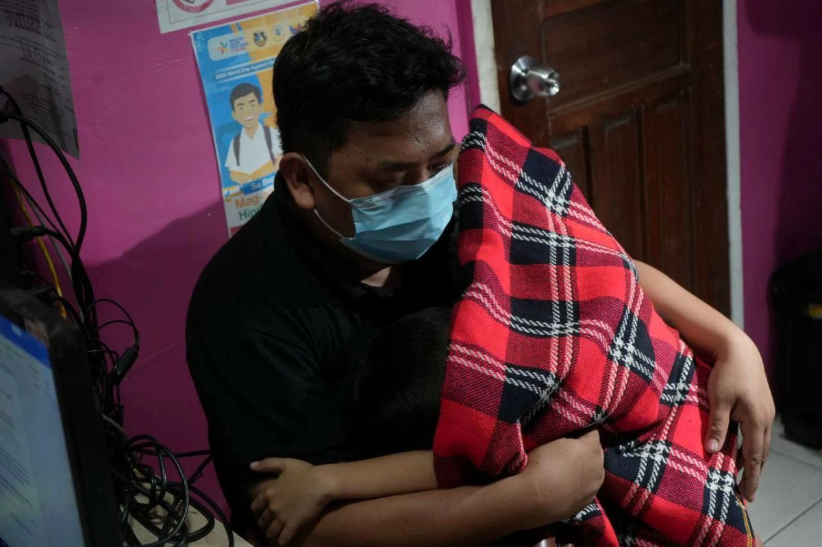 The uncle who rescued the child from his stepfather. (Photo from Caloocan City Government)