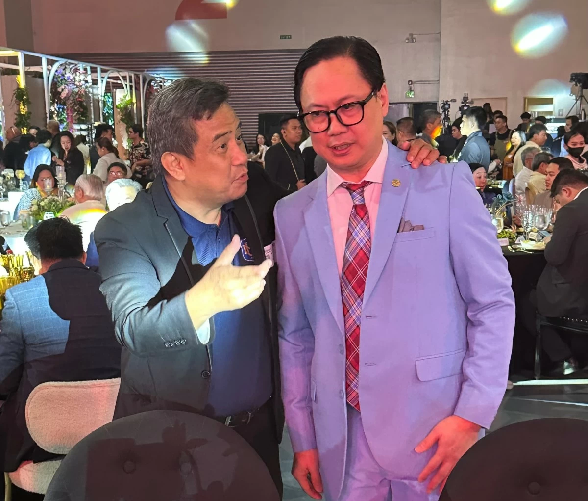 NU’s Adolf Aran Jr. and SMX’s Michael Albaña