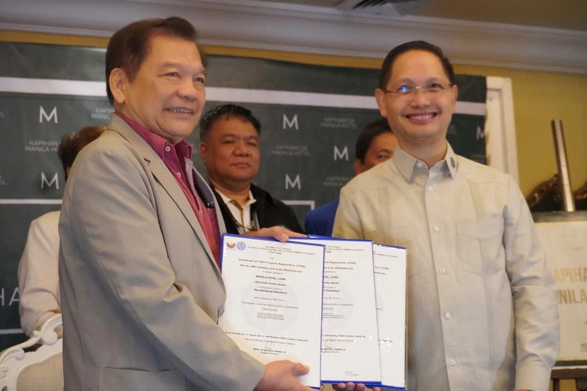 The Manila Hotel president Atty. Jose D. Lina, Jr. with TESDA Secretary Francisco Benitez