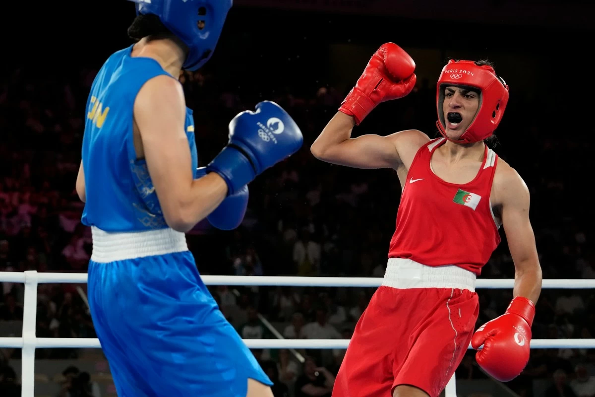 FILE - Algeria's Imane Khelif, right, fights China's Yang Liu in their women's 66 kg final boxing match at the 2024 Summer Olympics, Friday, Aug. 9, 2024, in Paris, France. (AP Photo/Ariana Cubillos, File)