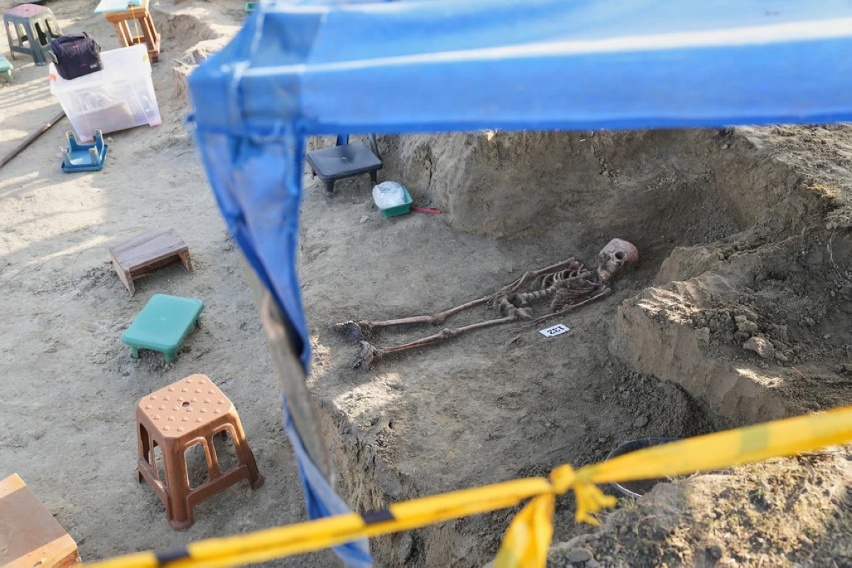 A number identifies a human skeleton exhumed from a mass grave in Chemmani, Sri Lanka, Aug. 5, 2025. (AP Photo/Eranga Jayawardena)