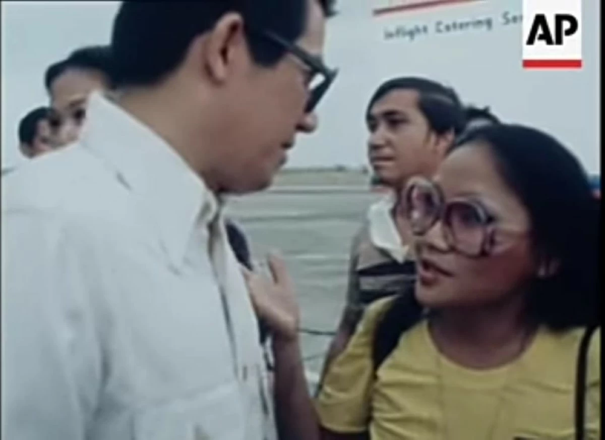 Ninoy Aquino Jr. with Sol Vanzi (Screenshot from AP Archive/Youtube)