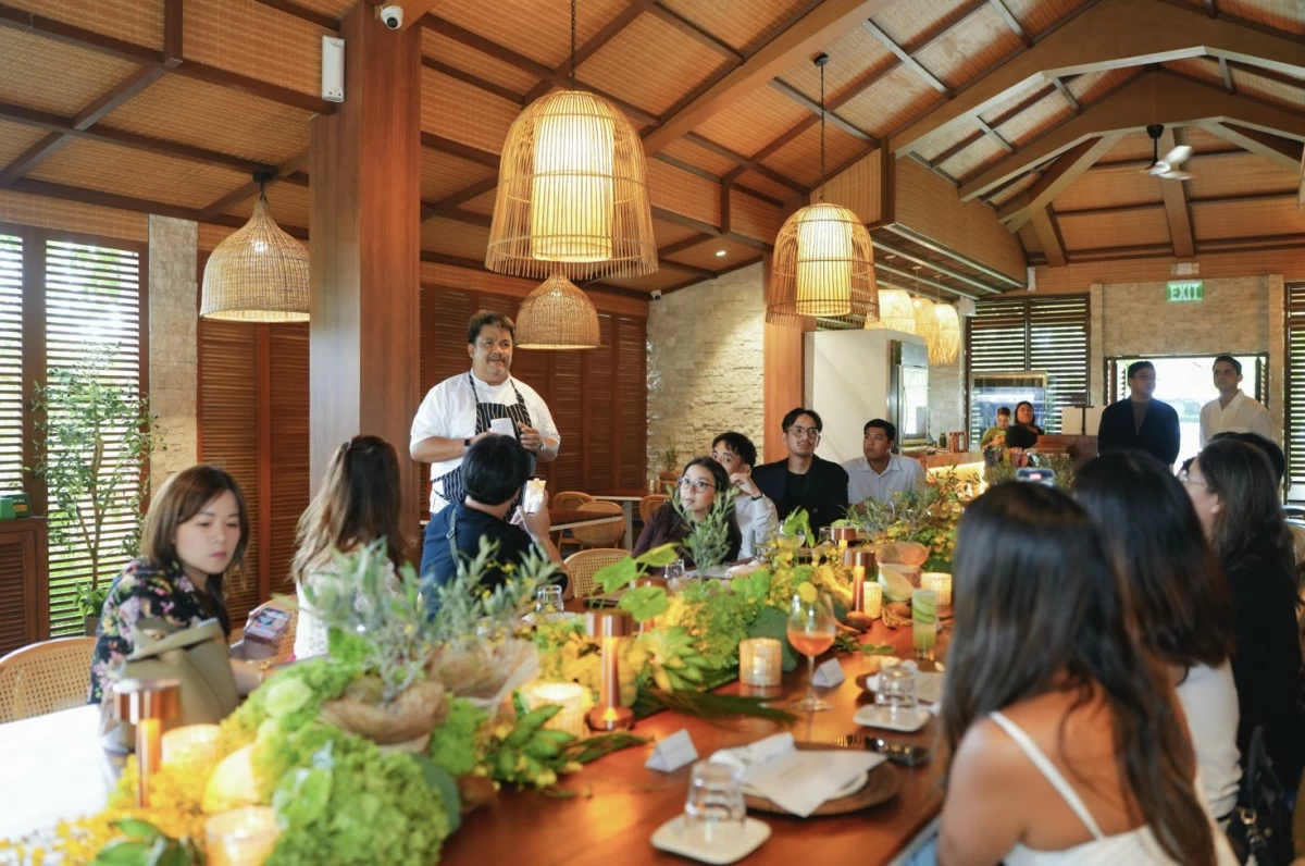 Chef Robby Goco relays the day's menu to guests