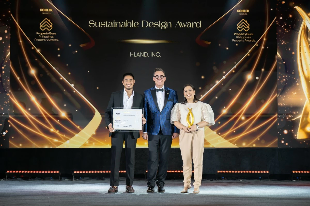 ISOC Land, Inc.'s President May V. Lopez and Marketing Manager Toby Diaz receive the developer award for Best Sustainable Design.