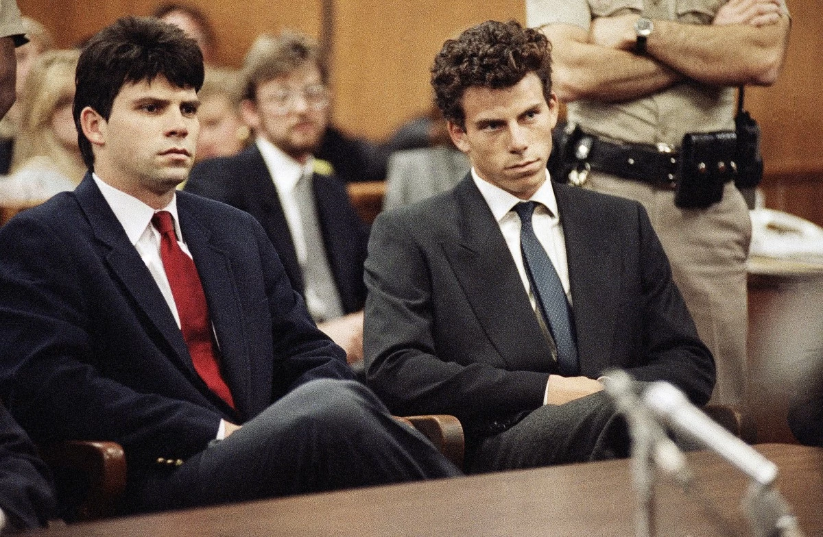 
LYLE (left) and Erik Menendez sit in Beverly Hills Municipal Court where their attorneys delayed making pleas on their behalf in Beverly Hills, California, March 12, 1990. (AP file photo)
