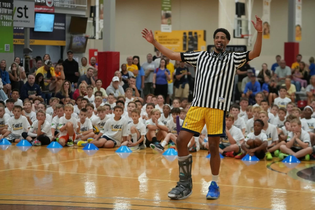 Indiana Pacers' Tyrese Haliburton watches a scrimmage during his basketball camp at the Indiana Pacers Athletic Center, Saturday, Aug. 23, 2025, in Westfield, Ind. (AP Photo/Darron Cummings)