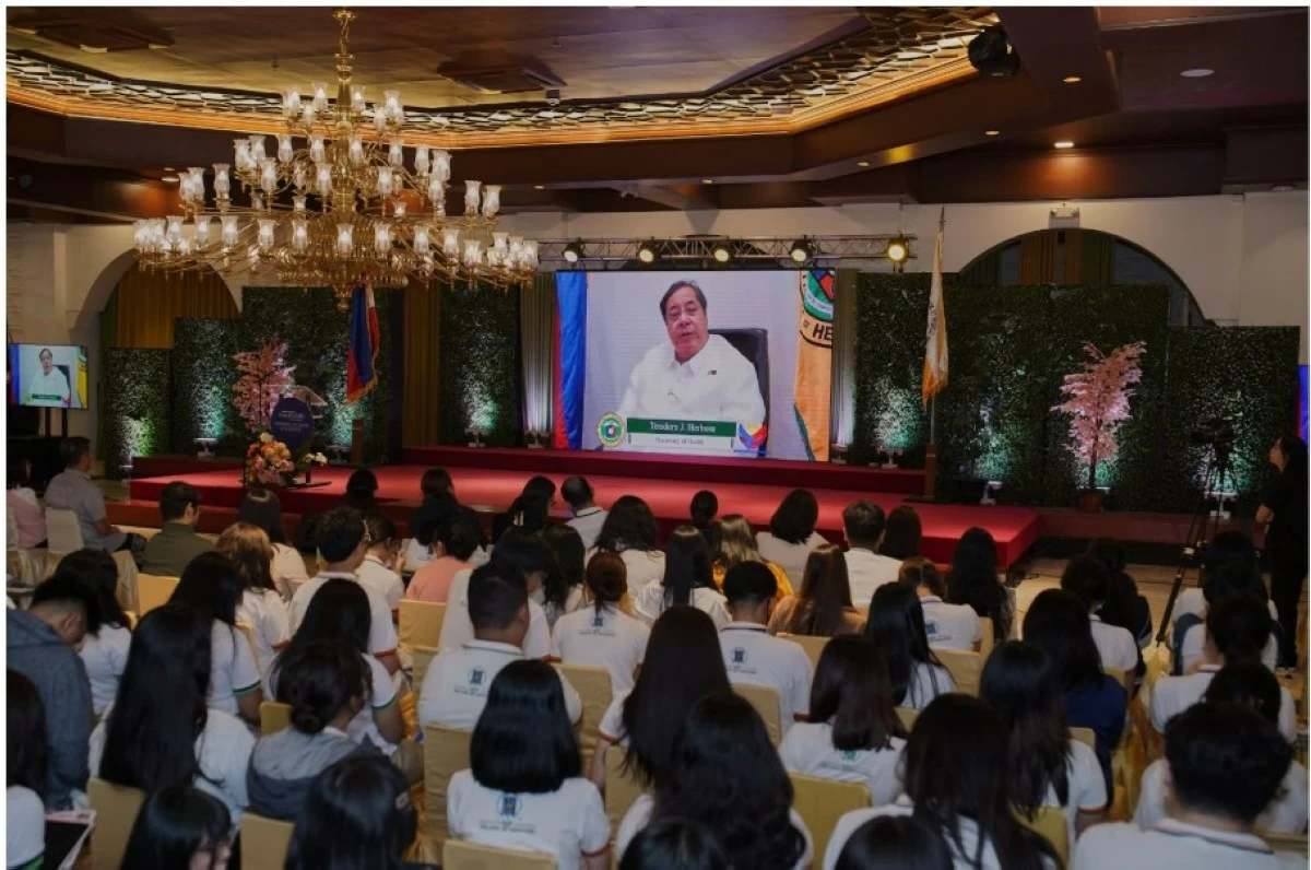 DOH Secretary Teodoro Herbosa delivers the opening remarks at the University of Santo Tomas on April 30, 2025, highlighting the importance of sustainable healthcare.
