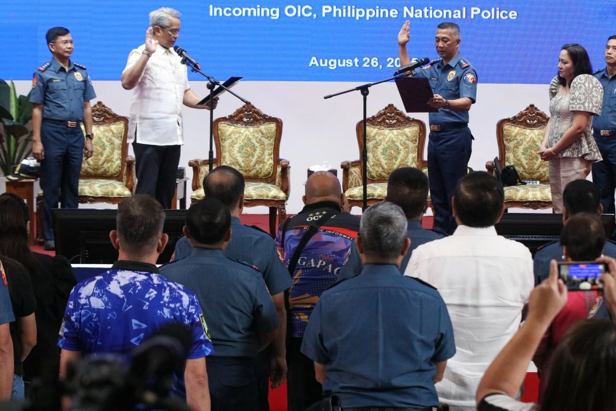 Department of the Interior and Local Government Secretary Jonvic Remulla administers the oath-taking of Police Lt. Gen. Jose Melencio Nartatez Jr. as officer-in-charge of the Philippine National Police (PNP) in a ceremony at Camp Crame in Quezon City on Tuesday, Aug. 26, 2025. (Santi San Juan)