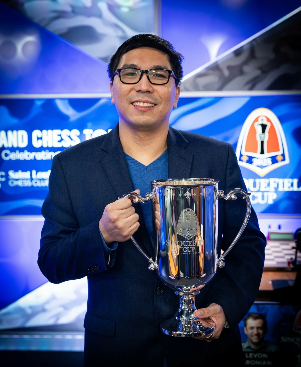 GM Wesley So poses with his trophy after winning the 2025 Sinquefield Cup. (Saint Louis Chess Club Facebook)