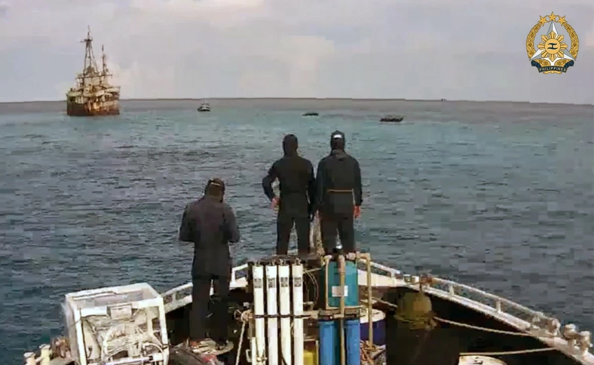 Armed Forces of the Philippines (AFP) personnel aboard MV Lapu-Lapu sails toward BRP Sierra Madre (LS-57) in Ayungin Shoal, West Philippine Sea on May 16, 2025 to deliver essential supplies during a rotation and resupply mission. (Photo: AFP)