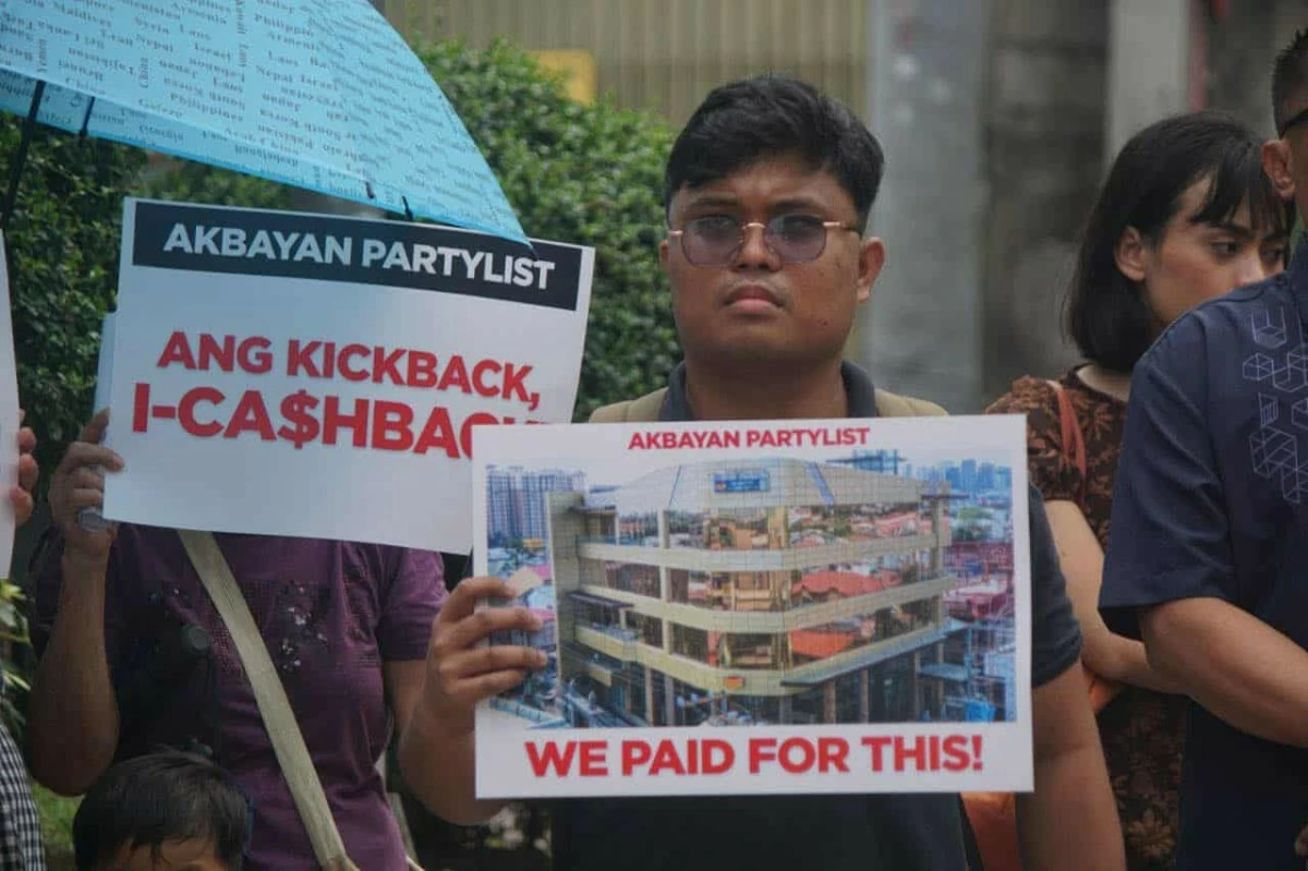 Members of the Akbayan Partylist protest outside St. Gerrard Construction in Pasig City to condemn its owners, the Discayas, over their alleged involvement in anomalous flood control projects. (Photos courtesy of Akbayan Partylist)
