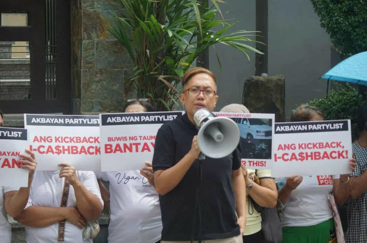 Members of the Akbayan Partylist protest outside St. Gerrard Construction in Pasig City to condemn its owners, the Discayas, over their alleged involvement in anomalous flood control projects. (Photos courtesy of Akbayan Partylist)
