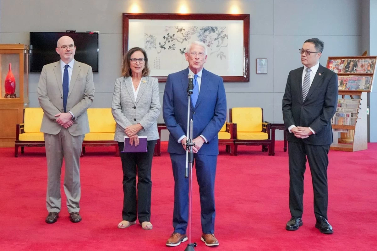 In this photo released by the Taiwan Ministry of Foreign Affairs, U.S. Senators Roger Wicker (Mississippi), center and Deb Fischer (Nebraska), third from left, speak to the media upon their arrival at Taipei Songshan Airport, on Friday, Aug. 29, 2025. (Taiwan Ministry of Foreign Affairs via AP)