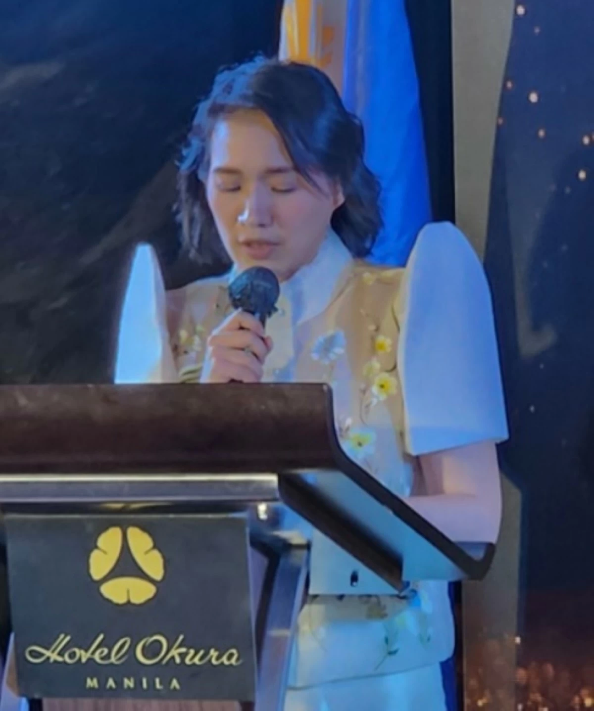 Dr. Beatrice Jane L. Ang, honorary consul of Ukraine in the Philippines, leads the gathering in prayer.