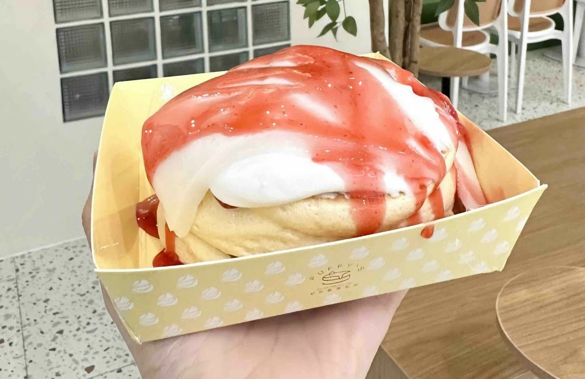 Soft, jiggly Strawberry Mochi Soufflé Pancake is made fresh at Puffy’s Soufflé Pancake Café.