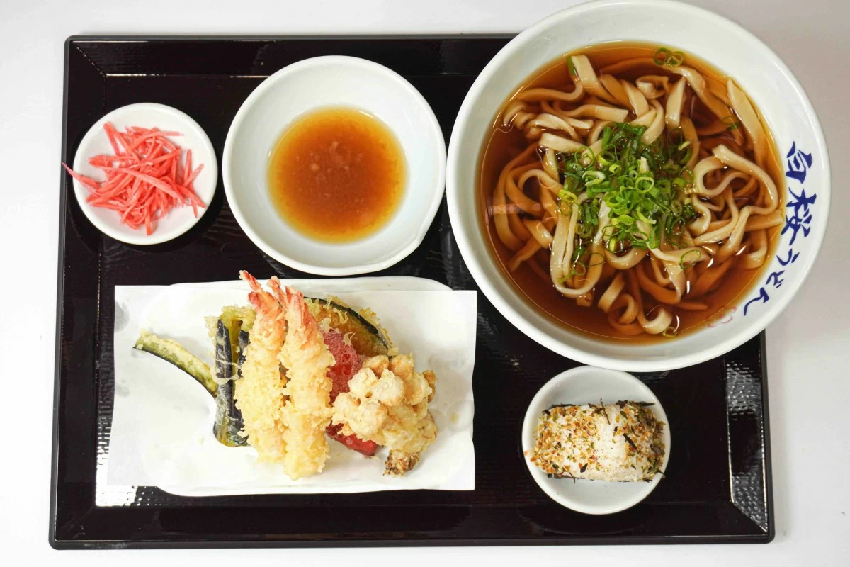 Enjoy a hot bowl of Udon with fresh hand-pulled noodles at Hakura Udon.
