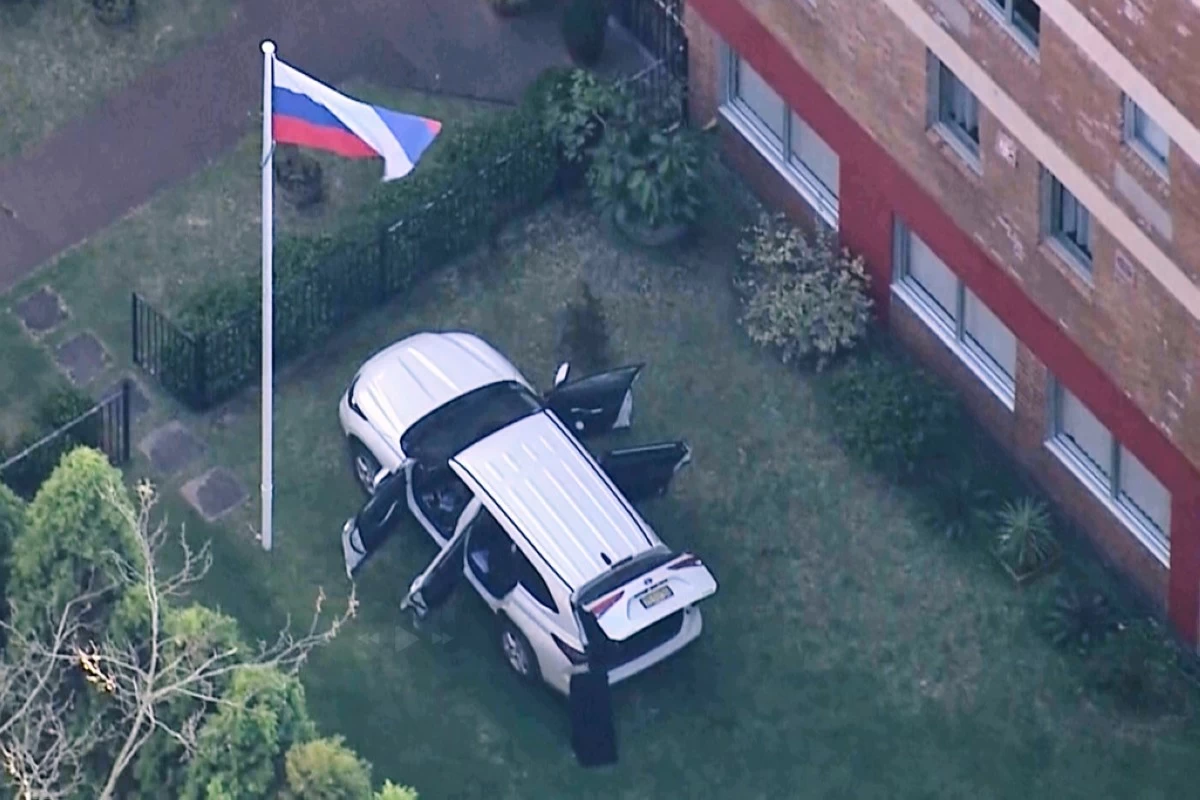 In this image made from video, a car is seen in the grounds of the Russian consulate in Sydney, Australia, Monday, Sept. 1, 2025. (AuBC/CH7 AUSTRALIA/CH9 AUSTRALIA via AP)