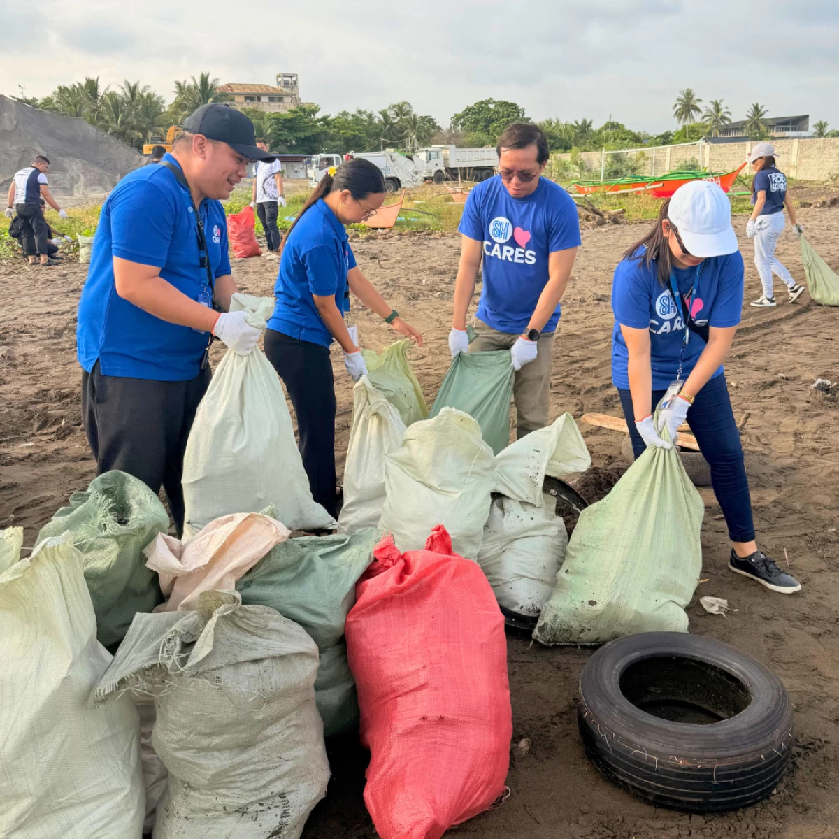 SM City Tanza volunteers lead a coastal cleanup to help protect the community during rainy season—proving that caring for the environment is also caring for each other.