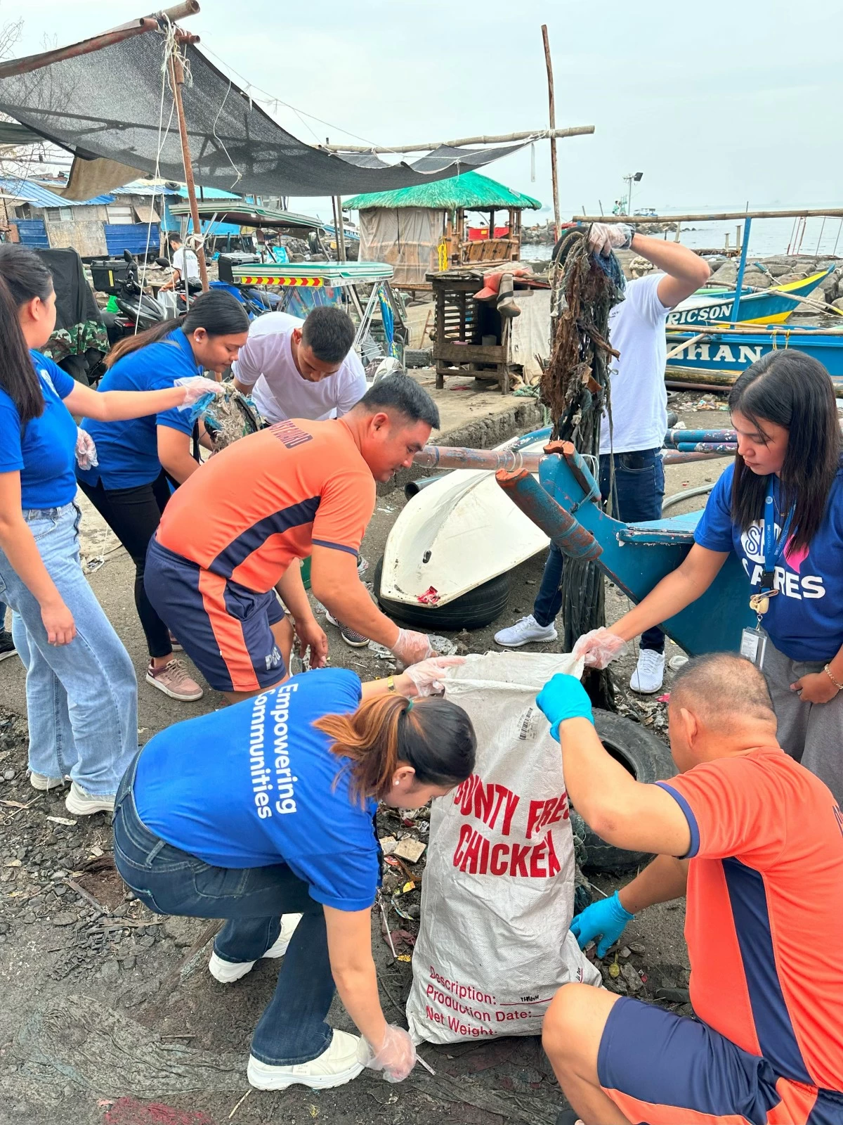 SM City Lucena volunteers join hands with the community in a coastal cleanup, creating a cleaner shoreline and a stronger, united future