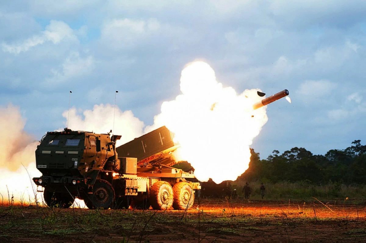 In this photo released by Indonesian Armed Forces information Center (Puspen TNI), on Wednesday, Sept. 3, 2025, a rocket is launched from a US Army's High Mobility Artillery Rocket System (HIMARS) during the live-fire exercise at Super Garuda Shield 2025, an annual joint military drill between Indonesia and the US, in Batu Raja, South Sumatra. (Puspen TNI via AP)