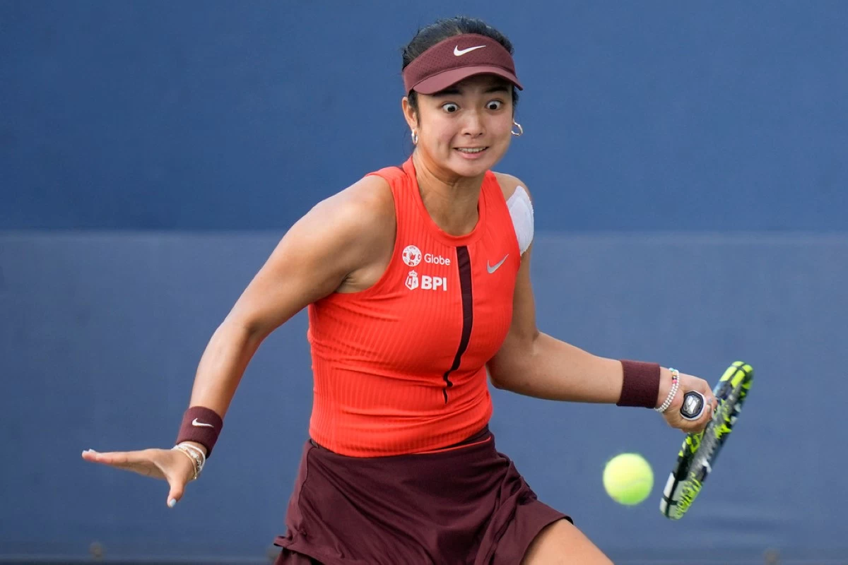 Alexandra Eala, of the Philippines, returns a shot to Cristina Bucsa, of Spain, during the second round of the U.S. Open tennis championships, Wednesday, Aug. 27, 2025, in New York. (AP Photo/Seth Wenig)