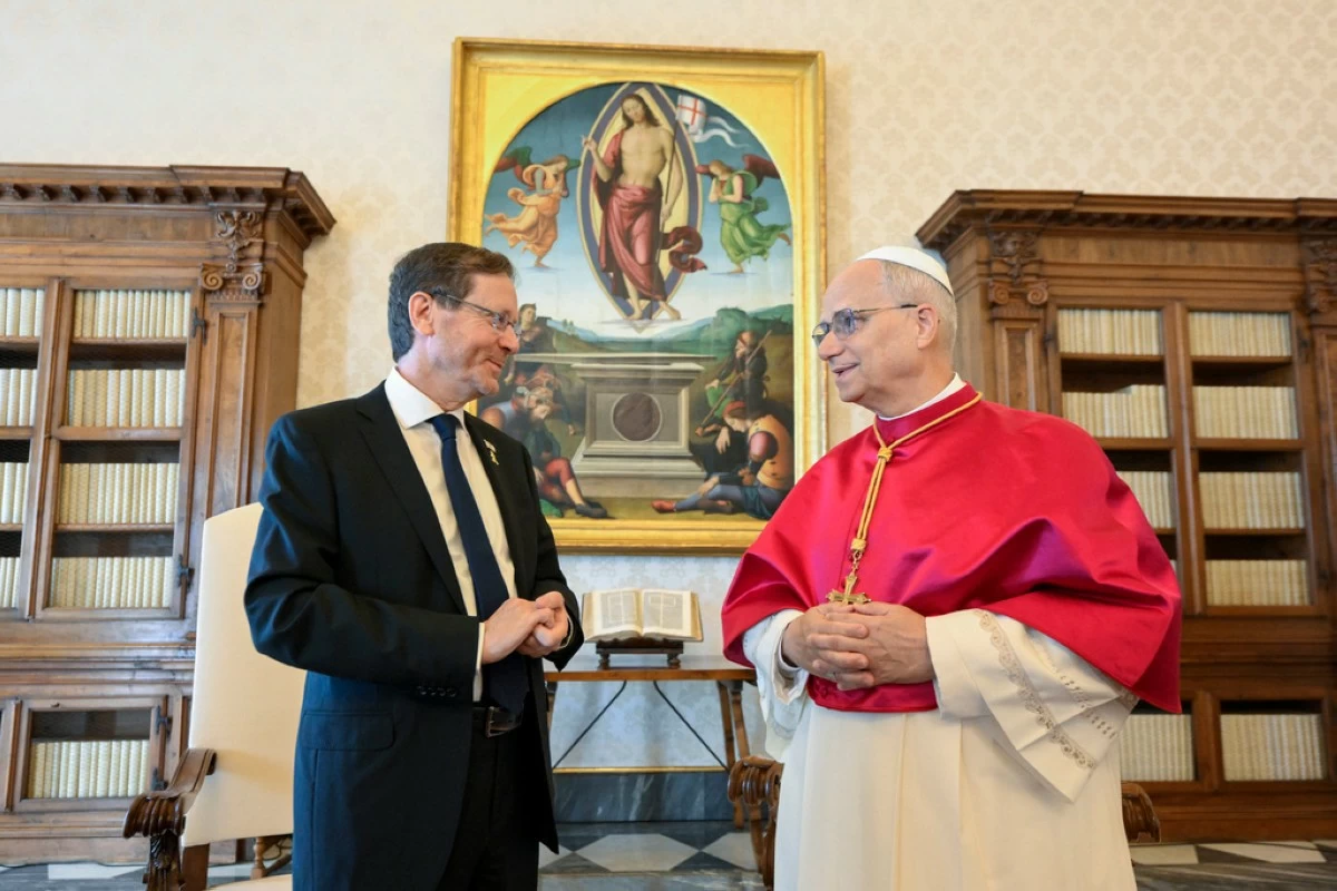 Israel's President Isaac Herzog, left, meets with Pope Leo XIV in the pope's private library during a private audience at the Vatican, Thursday, Sep. 4, 2025. (Simone Risoluti/Vatican Media via AP)