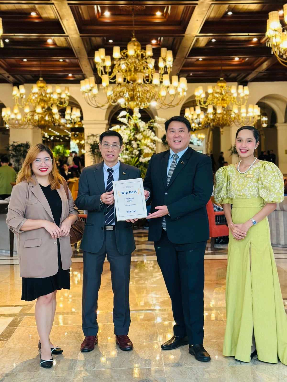 Rose Angelie Quilicol, market manager for High Star and Local Chains of Trip.com; Louie Reyes, revenue manager of The Manila Hotel Marvin Kim Tan, vice president for sales and marketing of The Manila Hotel