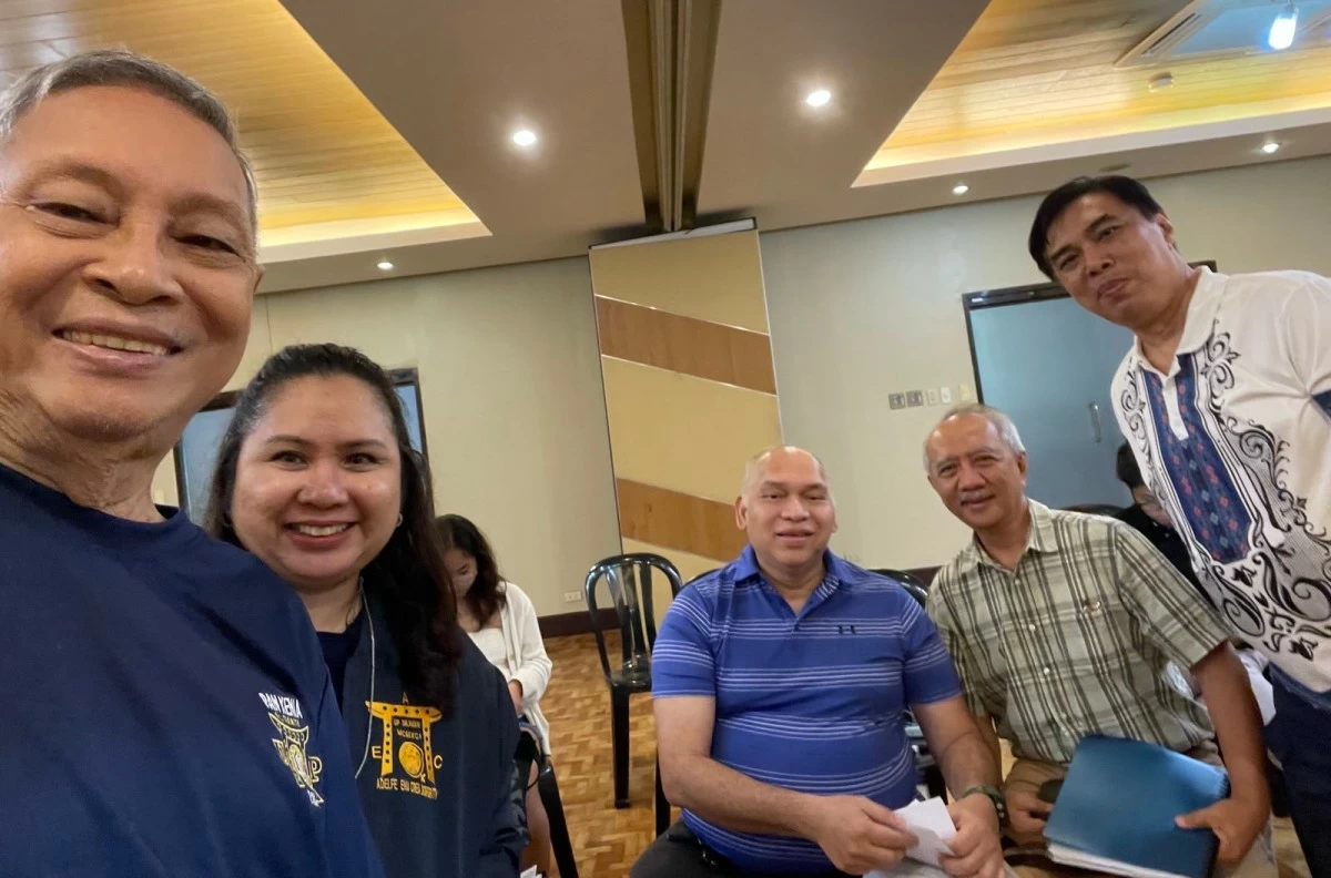 Pan Xenia and Adelfe Enu Crea Singers practicing with the UP Concert Chorus and Conductor Jai Aracama