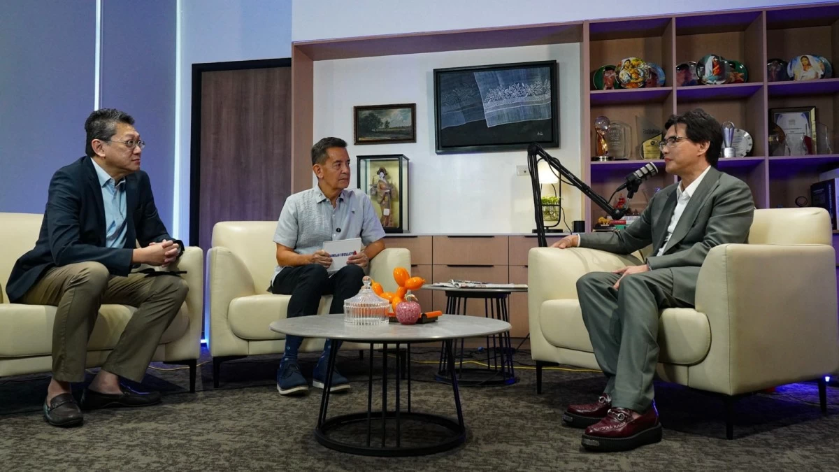 Your columnist with James Loyola, interviewing SM Supermalls President and CEO Steven Tan.