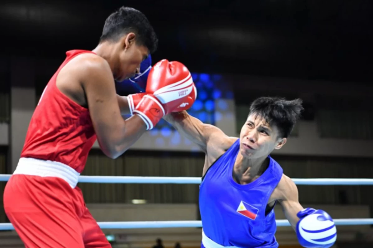 Riza Pasuit, right. (File Photo/ASBC)