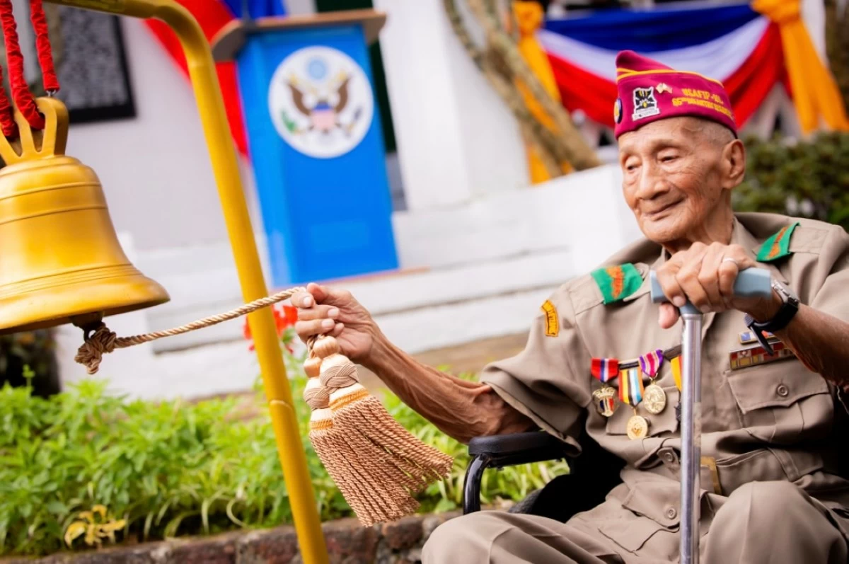 World War II veteran Corporal Ernesto C. Luis Sr. rings the ceremonial bell at 12:10 p.m., marking the exact minute of General Yamashita’s surrender to Filipino and American forces in 1945.