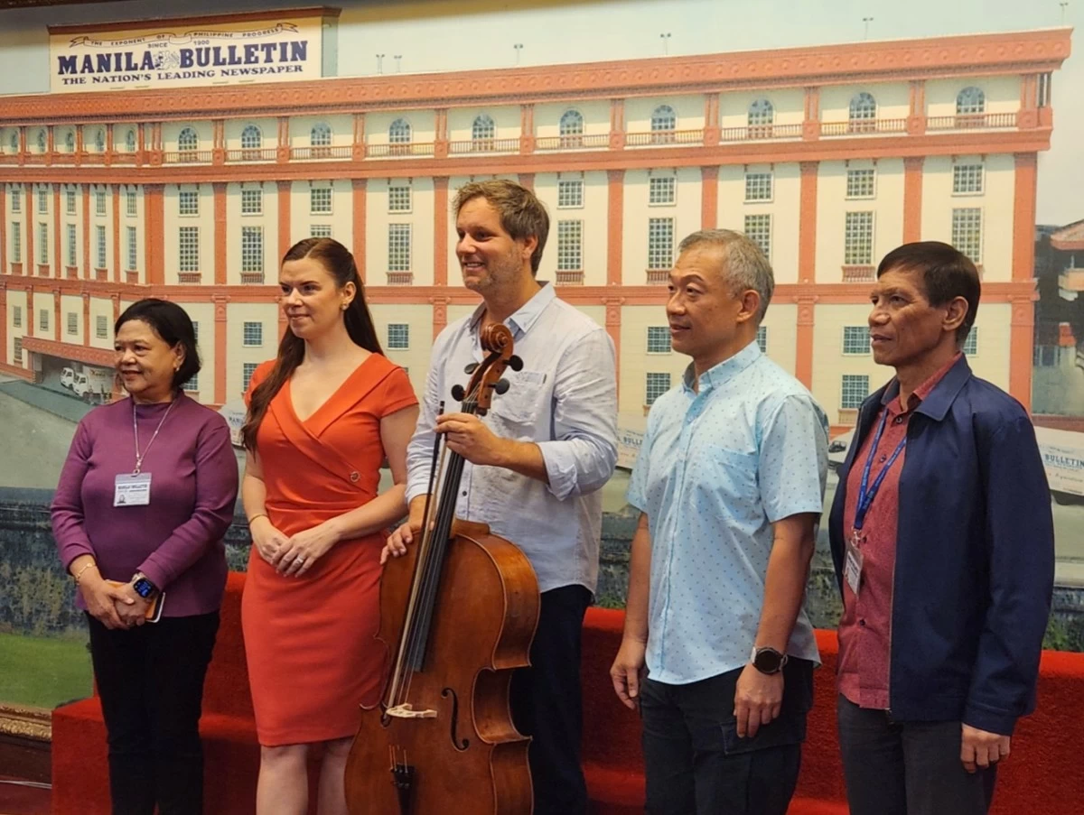 Hungarian cellist Zoltán Onczay, accompanied by Ambassador Dr. Titanilla Tóth of the Embassy of Hungary, with Manila Bulletin executives SVP Aurora C. Tan, Vice Chairman and President Dr. Emilio C. Yap III, and VP PBGen Reynaldo S. Rafal (Ret), during a special visit to the MB headquarters