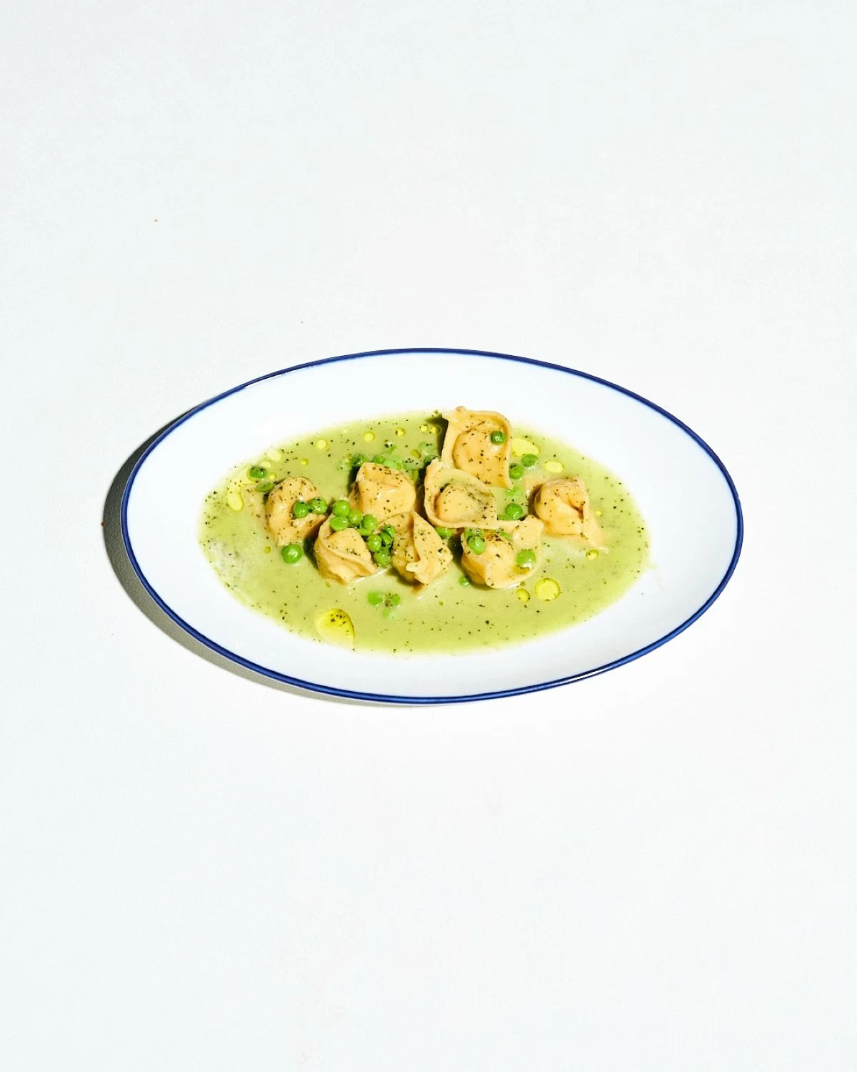 FOLDED COMFORT Hand-shaped tortelloni at Osteria, filled and served al dente, showcasing Josh Boutwood’s honest and soulful take on Italian pasta.