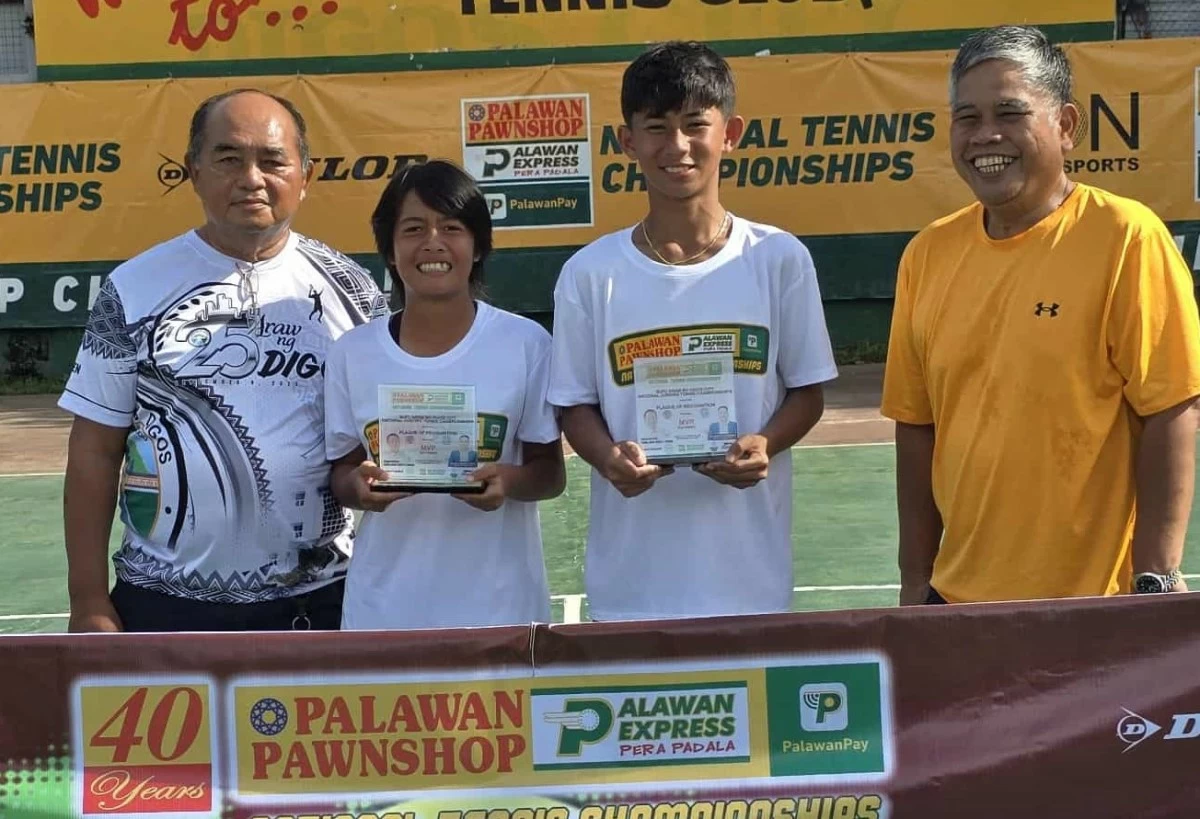 Ayl Gonzaga (second from left) and Krelz Gecosala (second from right) display their awards after sharing MVP honors at the MJFC Araw ng Digos National Junior Tennis Tournament. Joining them are Digos City Tennis Club president Reuben Paden (left) and Digos City Sports Program consultant Rey Loyola. (Contributed photo)