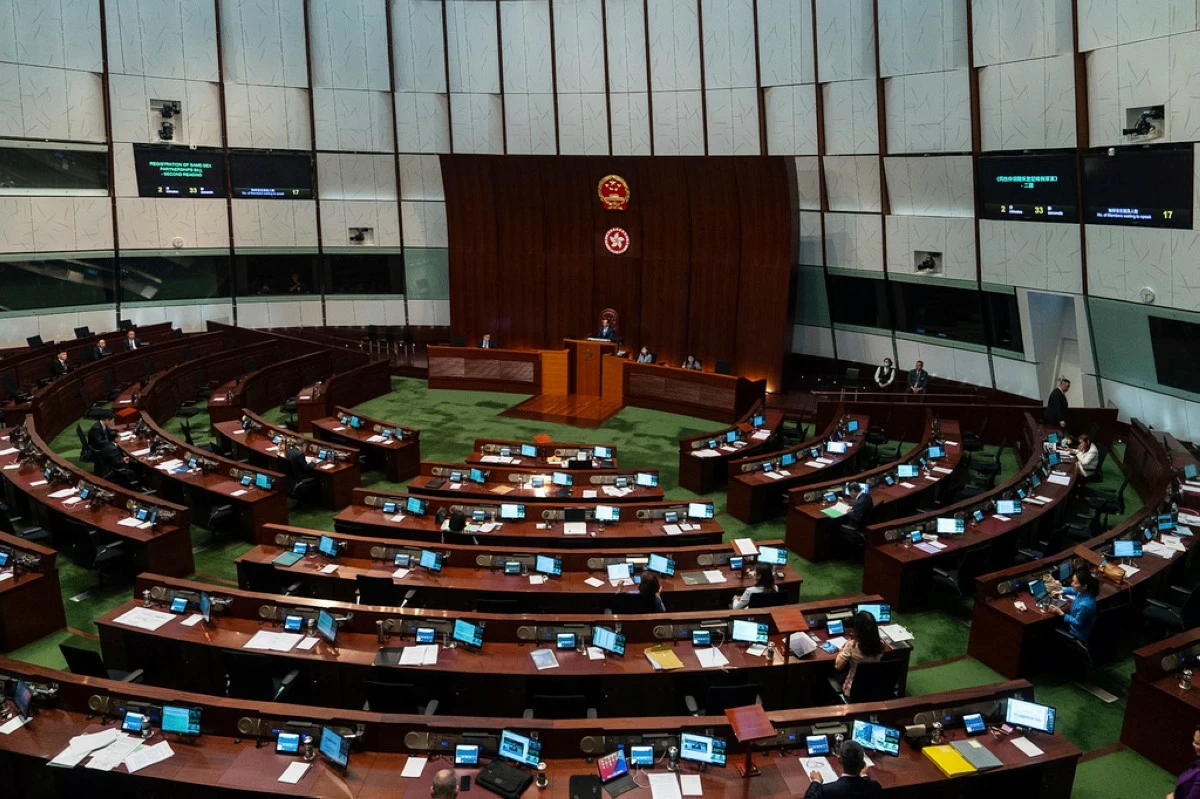 Lawmakers resume debate on a government bill that proposed to grant recognition to same-sex in Hong Kong, Wednesday, Sept. 10, 2025. (AP Photo/Chan Long Hei)